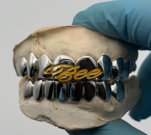 Silver full set with yellow "Bee" script
